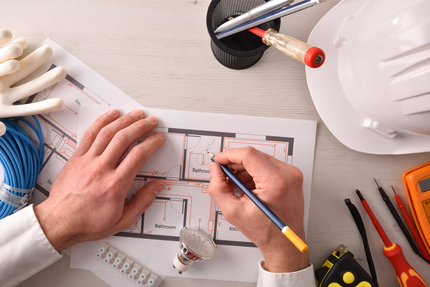 Technical Engineer In Electricity Writing In An Electrical Plan